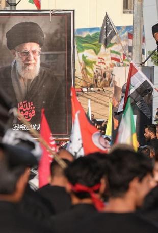 Iraqs holy cities host funeral processions for Khamenei