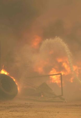 Wildfires overwhelm exhausted firefighters in France and Spain