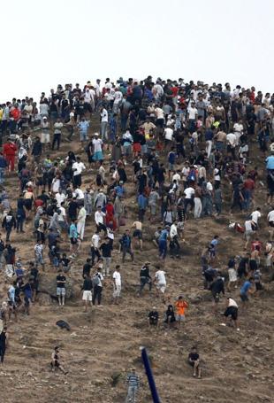 Around 40,000 migrants have crossed in recent days from Morocco into Spains Ceuta: police