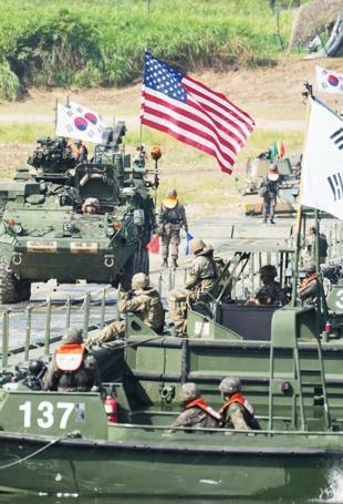 US scales back military drills with Seoul hours before start