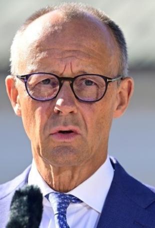Germanys Merz addresses critics with climate action pledge