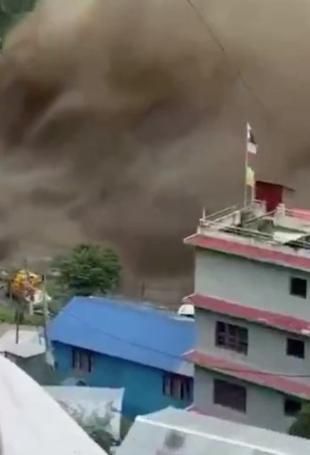 Deadly flood hits Nepal-Tibet border, hundreds unaccounted for