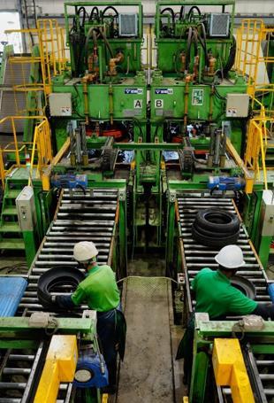Japan to relax overtime regulation under workaholic PM