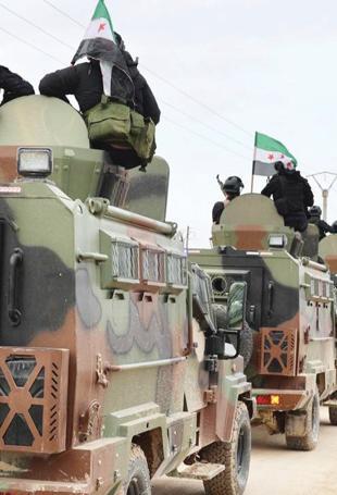 Syria begins SDF heavy weapons handover