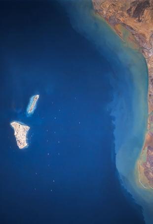 Iranian media report explosions near Kharg Island