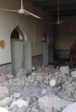 Death toll from attack at police HQ in Pakistan rises to 31