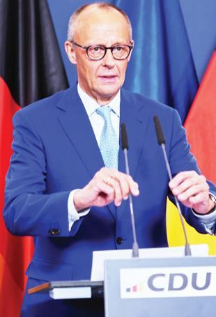 Merz under pressure after bruising state election loss-es