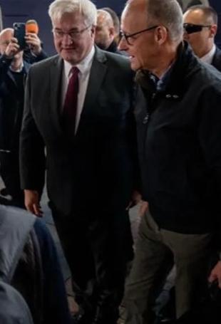 Russian strike hits Kyiv bridge as Merz visits