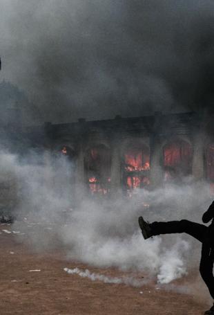 France counts cost of violent protests, 1,800 arrested