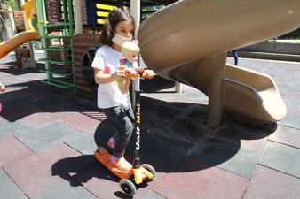 Turks under 14 venture out for four hours as virus rules ease