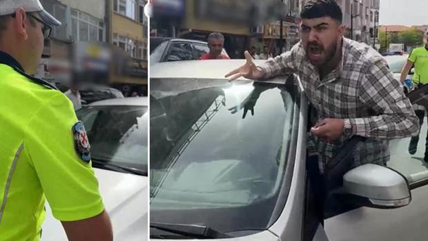 Aksaray'da aracını kendisini uyaran trafik polisinin üzerine sürdü! O anlar kamerada