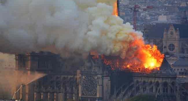 Notre-Dame fire extinguished, Macron vows to rebuild