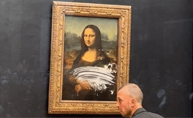 Activists splash soup on glass-protected Mona Lisa