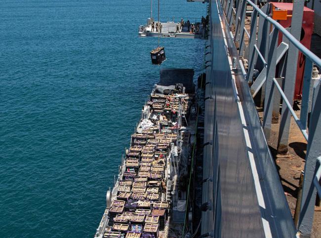 First aid enters via US-built pier as strikes continue in Gaza