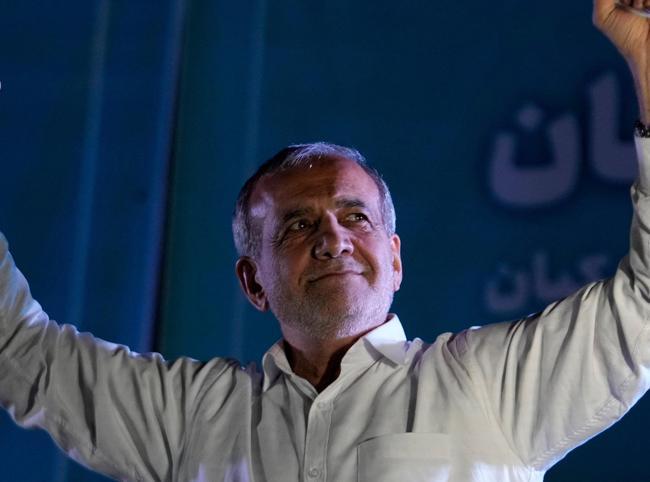 Calling for better ties with West, Iran reformist wins presidency