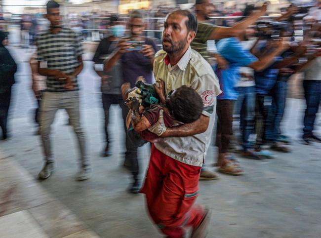 Deadly strike hits Gaza school as heavy battles displace Palestinians