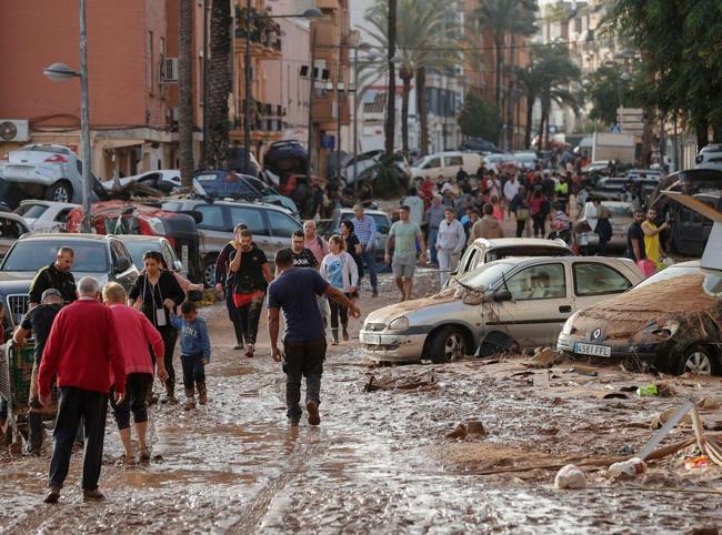 Spain races to save victims as floods kill 95