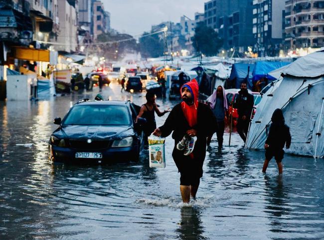 Fresh rains flood streets in war-scarred Gaza