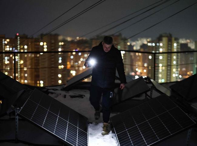 Kiev locals pool together for solar panels, batteries