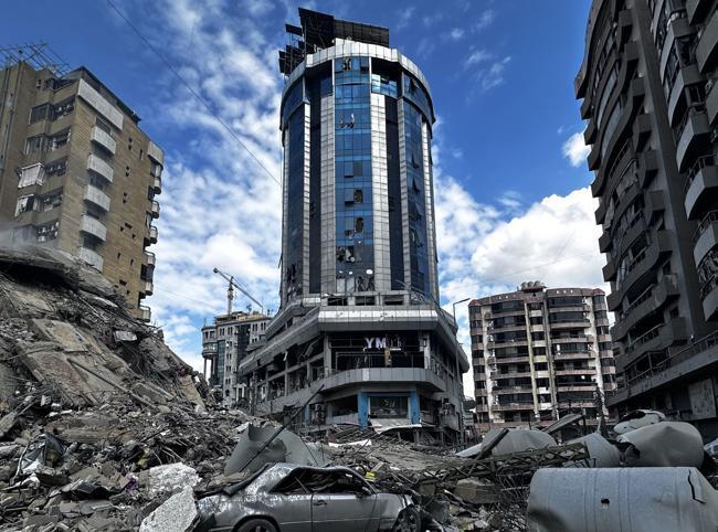 Iran says can fight for months as Israel strikes Beirut hotel