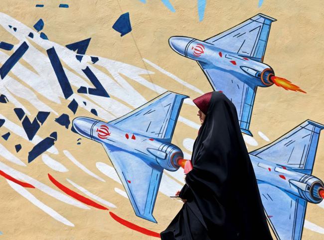 Tehran residents relieved but divided by Trump truce