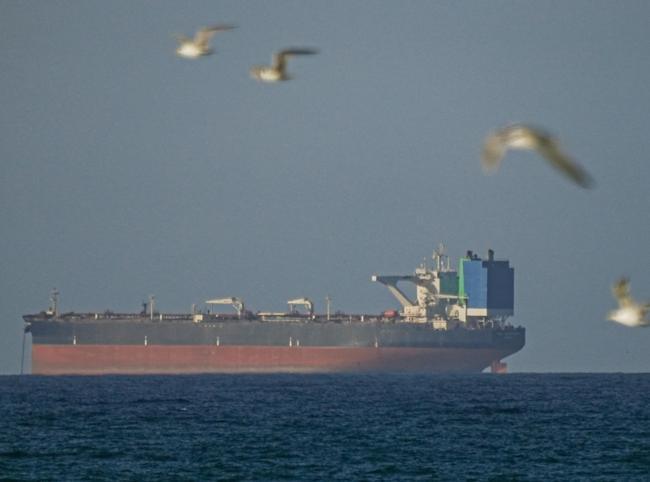 Iran threatens to close Hormuz again if US blockade continues