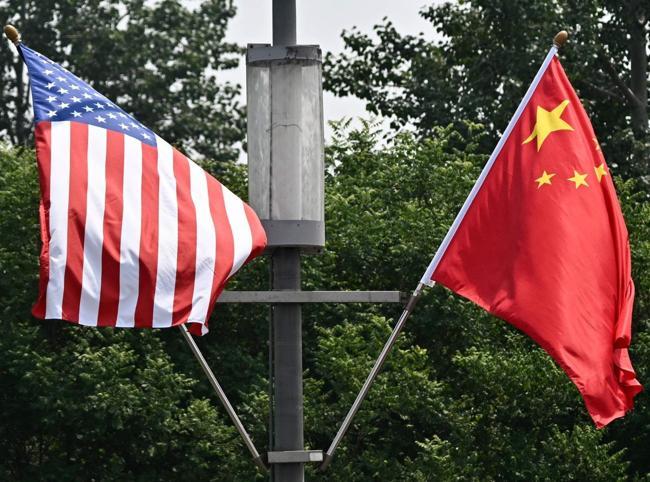 Trump vows to push Xi to open up China at superpower summit