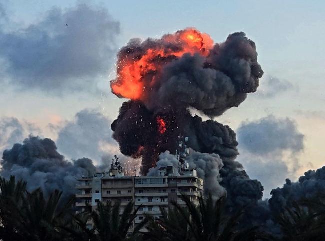 Israeli strike hits south of Beirut as Lebanon says raids kill 14