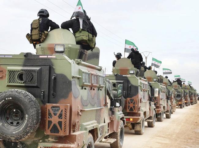 Syria begins SDF heavy weapons handover