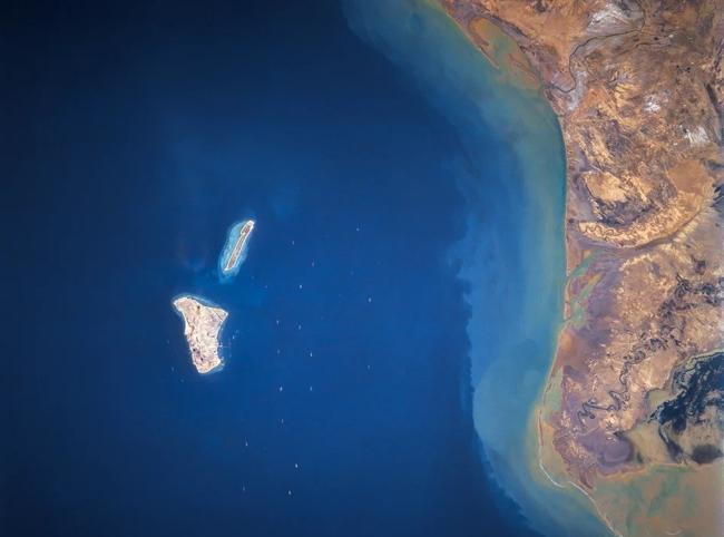 Iranian media report explosions near Kharg Island