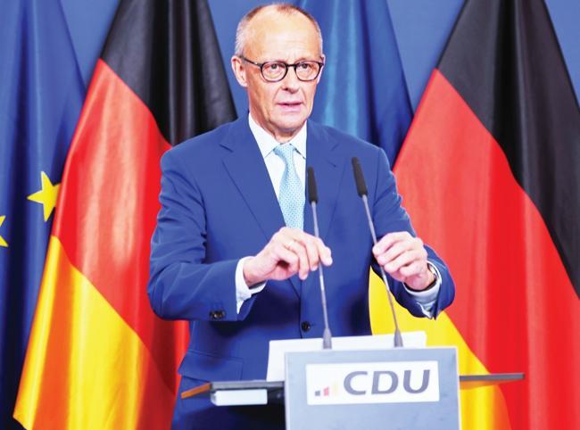Merz under pressure after bruising state election loss-es