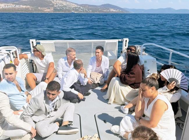 Migrants disguised in suits intercepted off Türkiye’s Muğla
