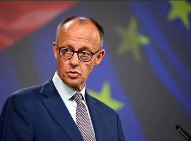 Merz visits Kyiv as Russia urges diplomats to leave