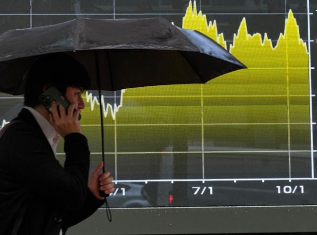 Investors brace for tech earnings, central bank decisions