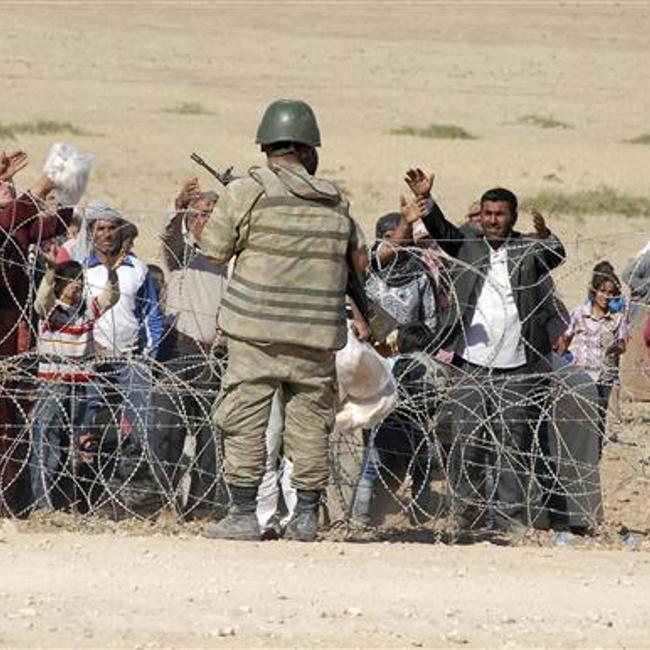 Turkey Opens Border To Syrian Kurds Fleeing Isil Offensive