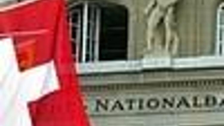 Swiss National Bank cuts interest rates by shock 1 pct