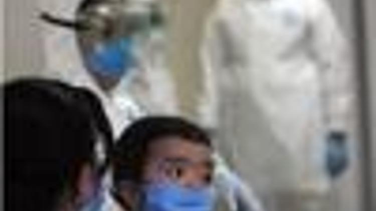 Lower Mexico flu death toll heartens nervous world