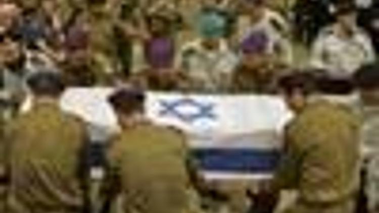 Israel buries soldiers recovered in prisoner swap