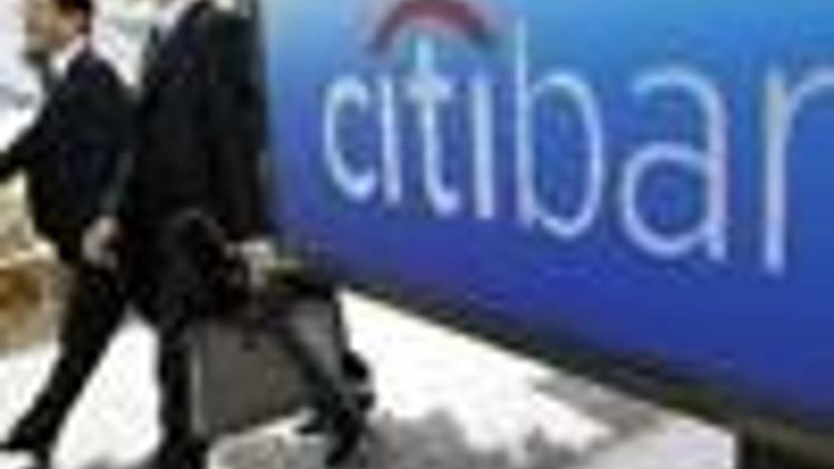 Citi loses $8.3 billion, separates into two units