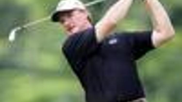 Ernie Els storms in joint lead at Singapore Open