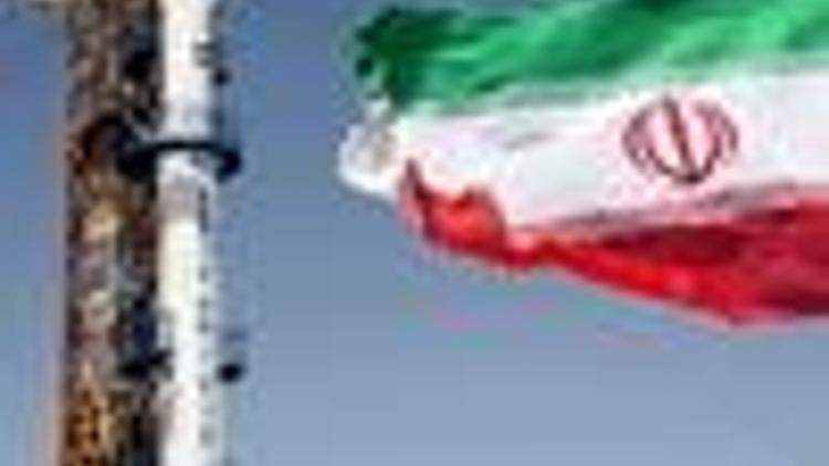 Iran insists satellite has no military aim, world powers meet in Germany