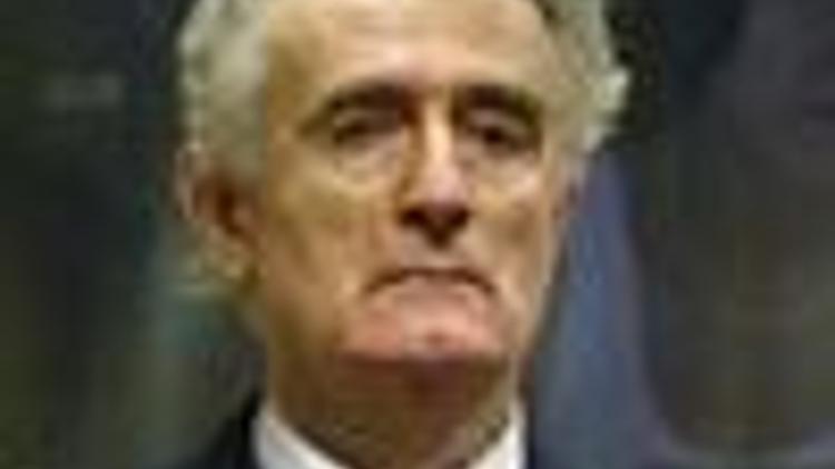 Karadzic says he cannot get fair trial; blames U.S.