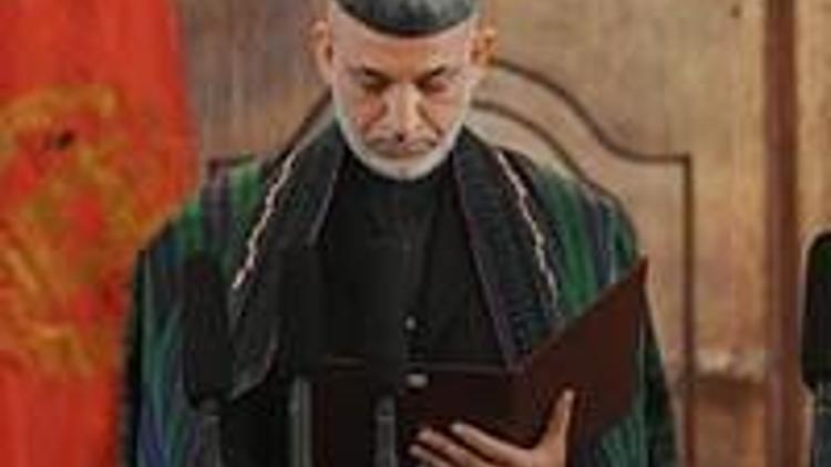 Karzaiyi bekleyen zorlu süreç