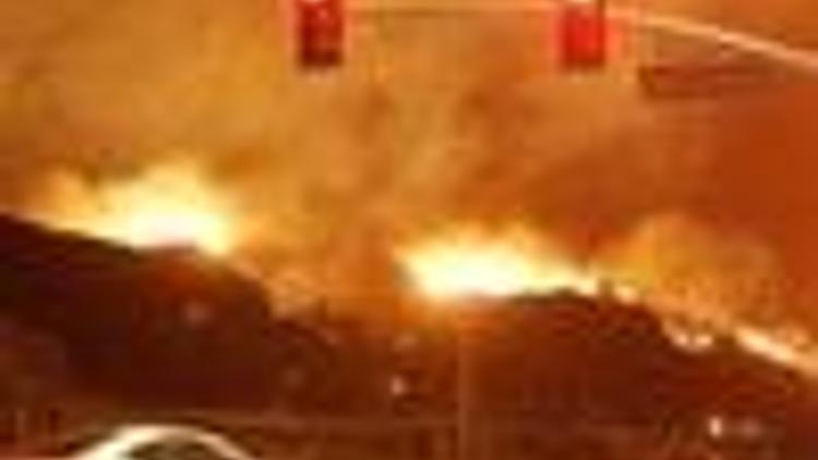 Photo Ed: California fires destroy 1,000 homes
