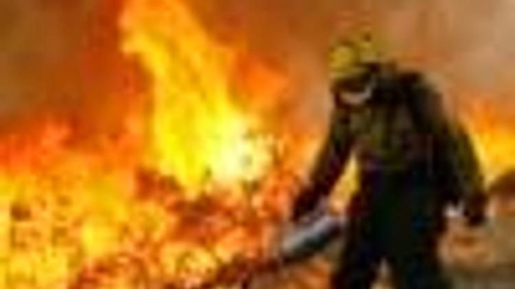 California firefighters soldier on as heatwave looms
