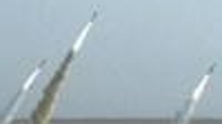 Iran tests more missiles, study urges U.S. to pursue long-term policies