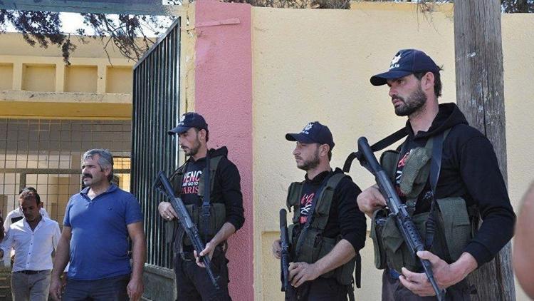 ÖSO üyelerine Türk polisi şapkası
