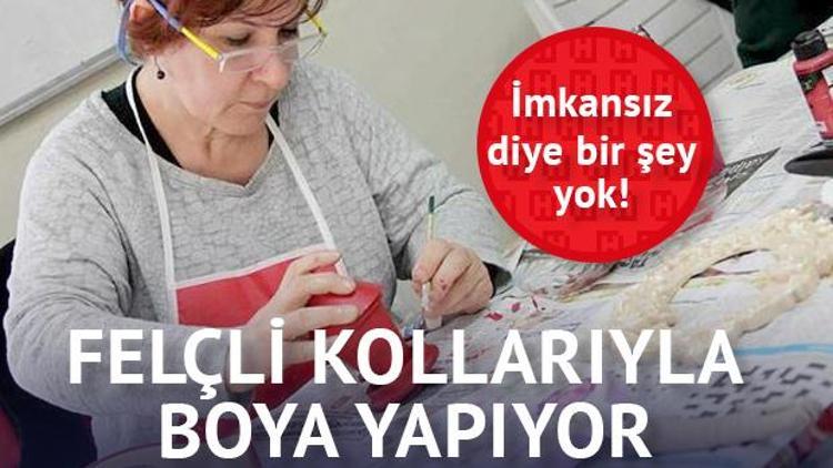 Felçli kollarına inat parmaklarıyla boya yapıyor