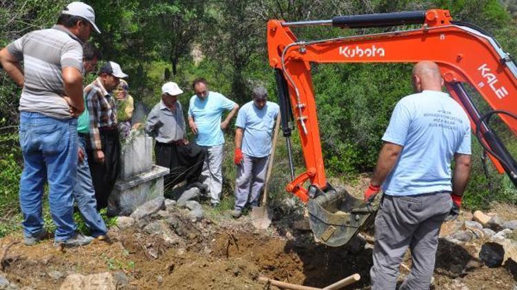 Su altında kalacak mezarlar taşındı