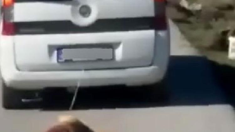 Köpeğini, aracın arkasında sürükleyen sürücüye para cezası